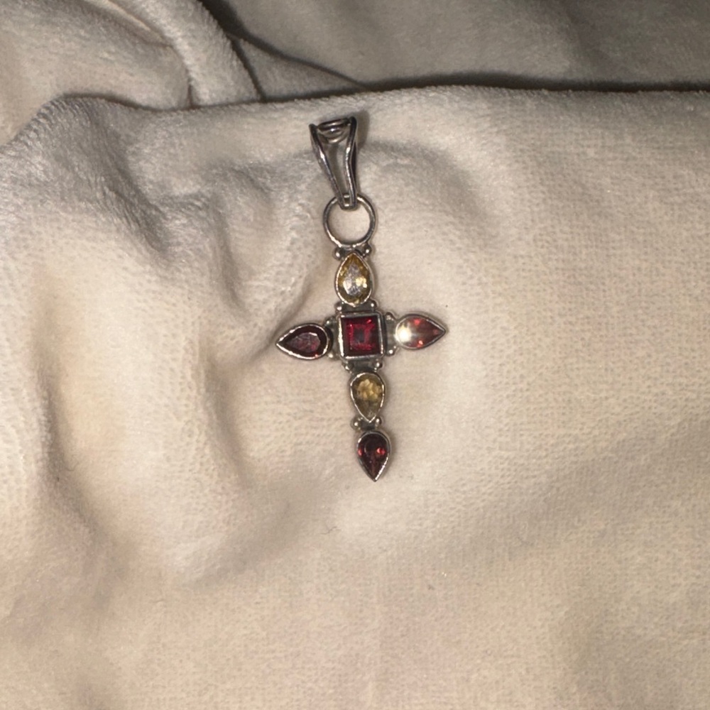 Elegant Silver and Red Gemstone Cross Pendant